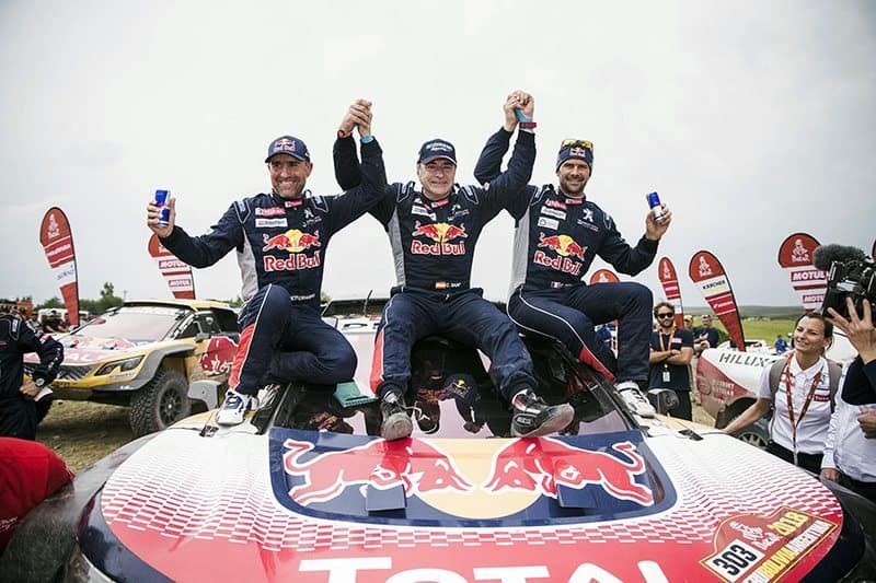 Stephane Peterhansel (FRA), Carlos Sainz (ESP) and Cyril Despres (FRA) of Team Peugeot TOTAL after the last stage of Rally Dakar 2018