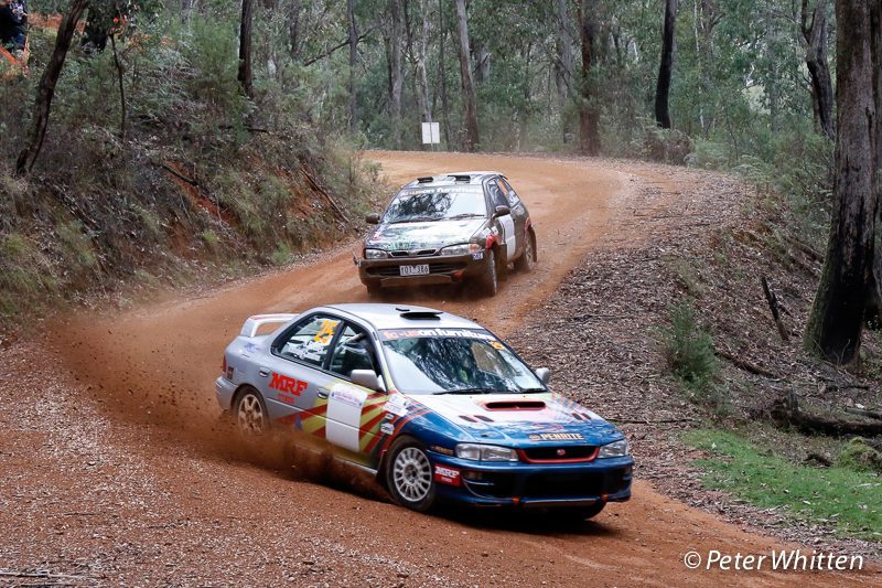 Stephen Eccles' Subaru and Jason Lennane's Proton do battle over the final stage at the Mitta Mountain Rally.